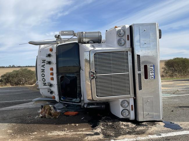 The grain truck rolled over at 5:25am this morning. Picture: Isaac Selby