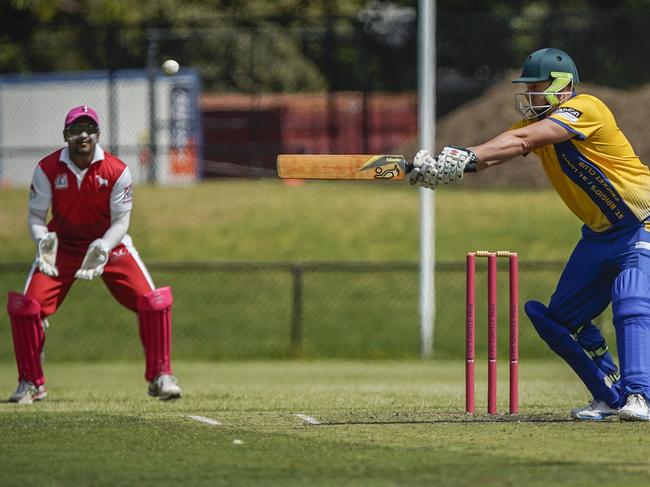 Mick Meehan cuts for St Brigid's/St Louis as Mordialloc keeper Damith Mapa Ralalage looks on. Picture: Valeriu Campan