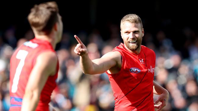 ADELAIDE, AUSTRALIA - MAY 07: Jake Stringer of the Bombers celebrates a goal during the 2023 AFL Round 08 match between the Port Adelaide Power and the Essendon Bombers at Adelaide Oval on May 7, 2023 in Adelaide, Australia. (Photo by Sarah Reed/AFL Photos via Getty Images)