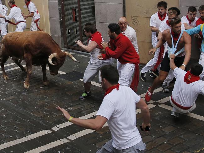 Aussie punters rough it up at The Running of the Bulls | Daily Telegraph