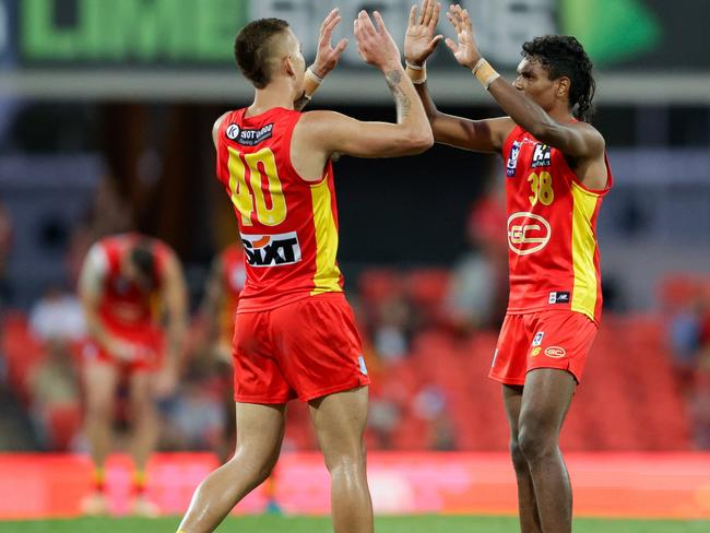 GOLD COAST, AUSTRALIA - SEPTEMBER 16: Joel Jeffrey and Lloyd Johnston of the Suns celebrate during the 2023 VFL Preliminary Final match between the Gold Coast SUNS and The Box Hill Hawks at Heritage Bank Stadium on September 16, 2023 in Gold Coast, Australia. (Photo by Russell Freeman/AFL Photos via Getty Images)