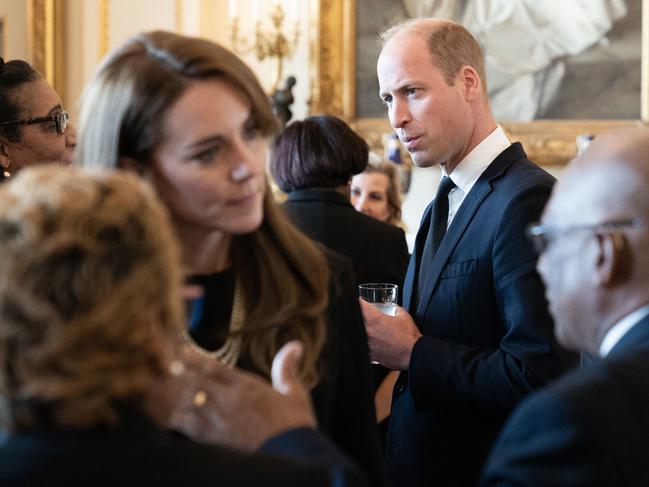 Catherine, Princess of Wales, and Prince William speak to guests during a lunch held for governors-general. Picture: AFP