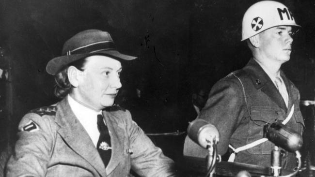 World War Two II Singapore Bangka Island massacre survivor nurse Sister Vivian Statham (nee Bullwinkel) (l) gving evidence at War Crimes trial in Japan 25 Jun 1958. 1950shistorical