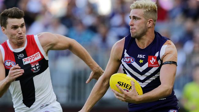 Luke Ryan rebounds out of defence for the Dockers.