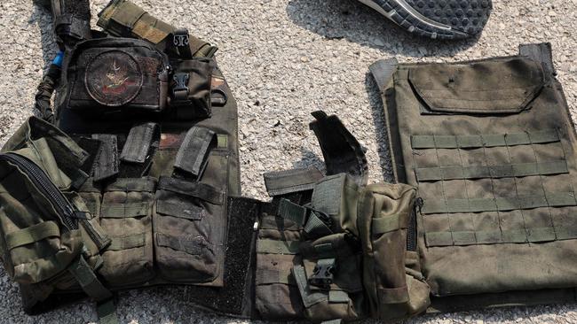 Parts of the military outfit of a Palestinian gunman who infiltrated into Israel, lie on the ground near the southern city of Sderot. Picture: JAck Guez/AFP