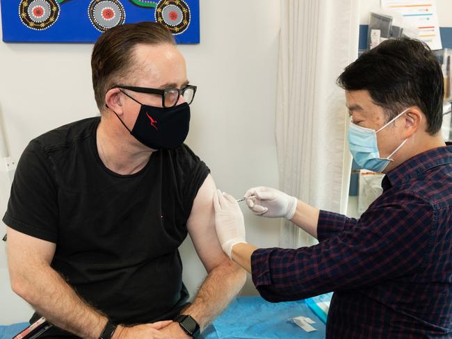 Qantas chief Alan Joyce rolled up his sleeve for the Covid-19 vaccination. Qantas has since mandated vaccination for all frontline employees, with an internal survey revealing the move has the overwhelming support of the airline’s staff. Picture: supplied