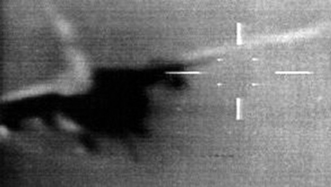 In the gunsight ... A frame capture of a Libyan MiG-23 flashing through the gunsights of a US Tomcat during the Gulf of Sidra incident. Source: USN