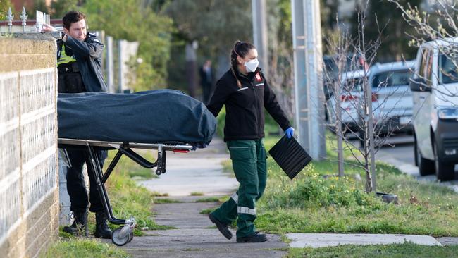 The body of a man was removed from the Lesley Grove home on Friday morning. Picture: Tony Gough