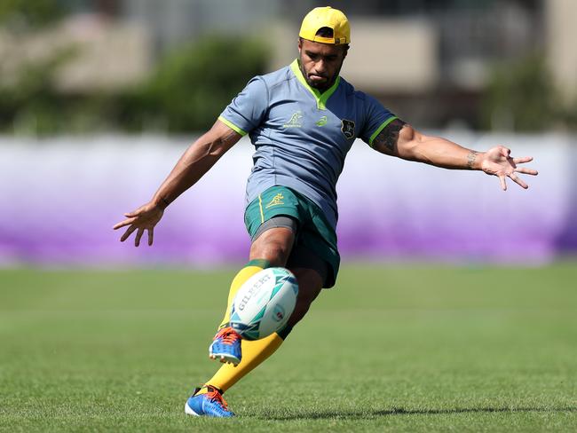 Will Genia kicks during the Wallabies’ final training session.