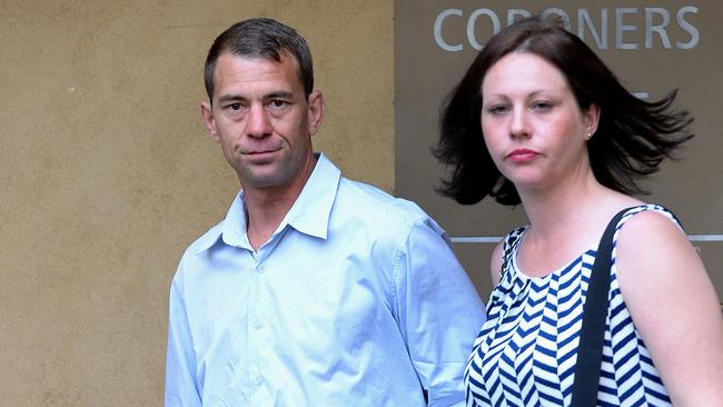 Son Joshua Herczeg outside the Coroners Court with his partner Jess. Picture Greg Higgs