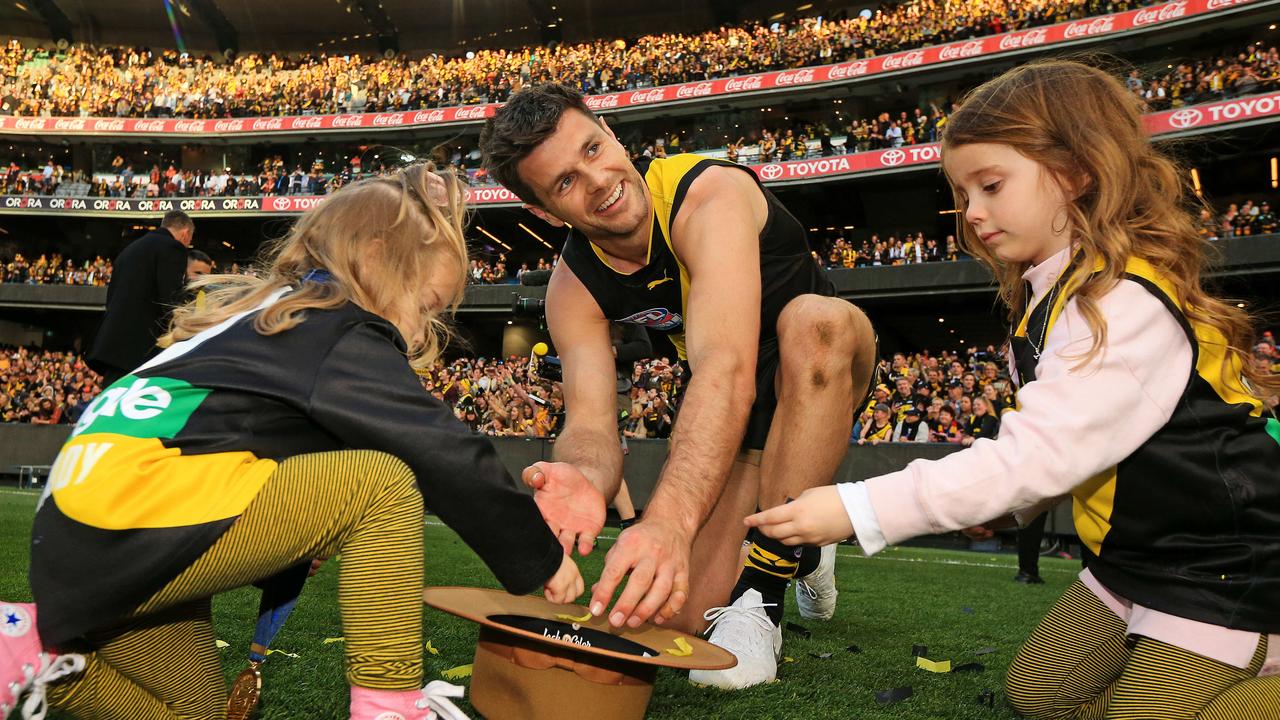 Cotchin and his two eldest daughters on the MCG. Picture: Mark Stewart