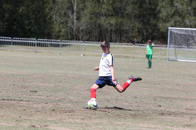 The Premier Invitational football tournament on the Gold Coast. Brisbane Roar Orange v TFC Brisbane White under-13s in action. Picture: Mike Batterham.