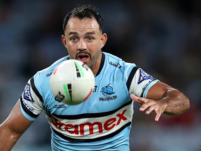 SYDNEY, AUSTRALIA - APRIL 13: Braydon Trindall of the Sharks kicks during the round six NRL match between South Sydney Rabbitohs and Cronulla Sharks at Accor Stadium, on April 13, 2024, in Sydney, Australia. (Photo by Brendon Thorne/Getty Images)