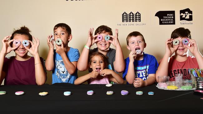 Kids will be able to roll and glaze their own Ken-Done- nuts in collaboration with Ken Done's exhibition at the Perc Tucker Regional Gallery. Tahlia See, 15, Jahrel See, 6, Zakobie See, 9, Ellariah See,3, Boston Sadler, 6, and Yarron See, 12. Picture: Shae Beplate.