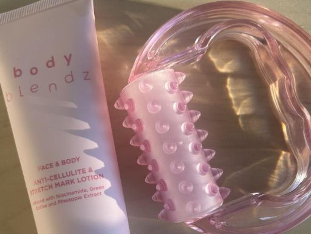 The massager tool ensures BodyBlendz Face + Body Anti Cellulite and Stretch Mark Lotion is evenly applied. Picture: Brittany Stewart