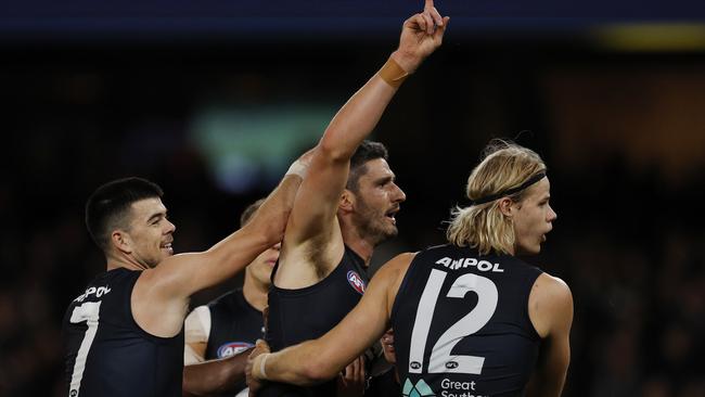 Marc Pittonet (centre) and Tom De Koning (right) will again ruck in tandem against the Giants, but Voss did not rule out rotating Harry McKay through centre bounces as well. Picture: Michael Klein