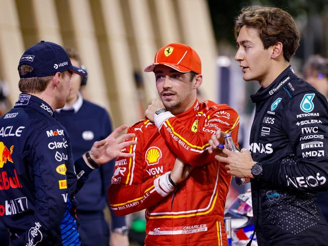 Max Verstappen speaks to Ferrari’s Charles Leclerc and Russell ahead of the Bahrain Grand Prix earlier this month. Picture: Bob McCaffrey/Getty Images)