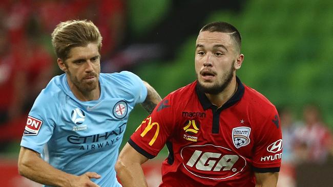 Adelaide United’s Apostolos Stamatelopoulos, 18, a product of the Reds youth development controls the ball in an A-League clash against Melbourne City at AAMI Park in January. (Photo by Robert Cianflone/Getty Images)