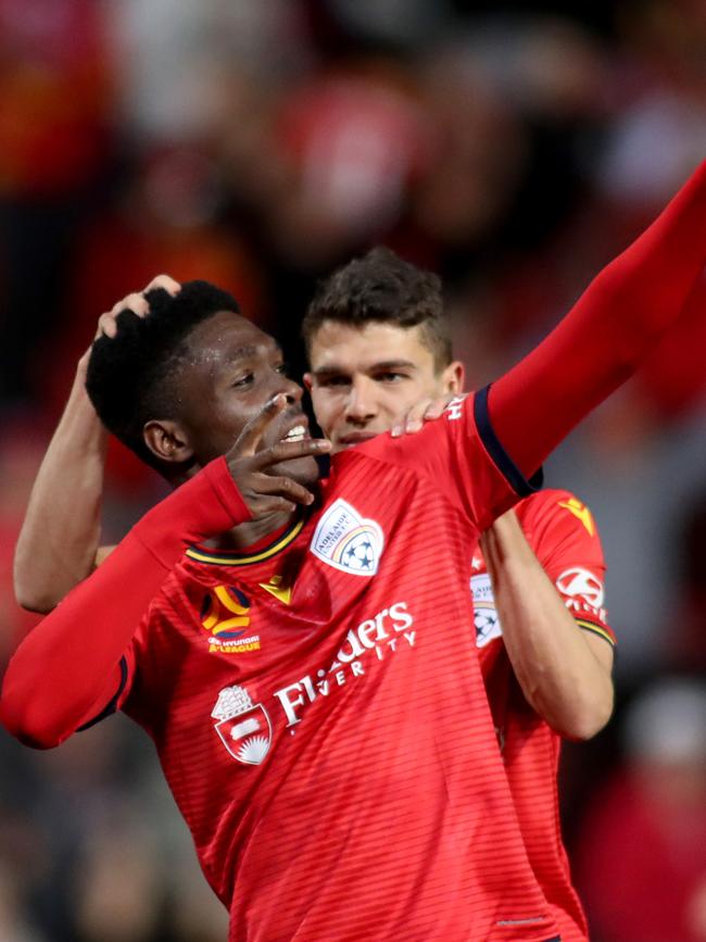 Al Hassan Toure of United celebrates a goal during the Round 1 A-League match between Adelaide United and Sydney FC at Coopers Stadium in Adelaide, Friday, October 11, 2019. Photo: Kelly Barnes/AAP.