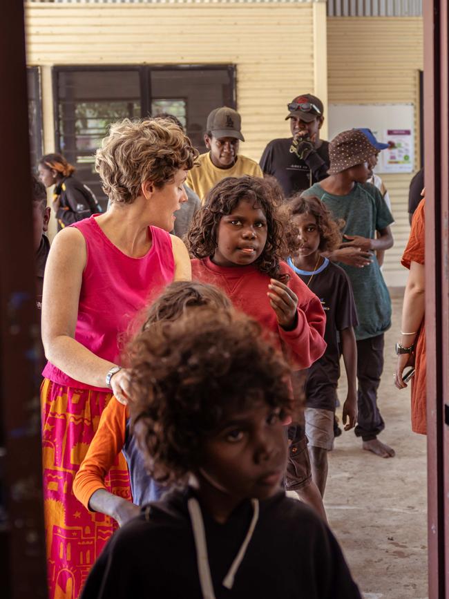 Teacher Madeleine Logan with students at Nawarddeken Academy's school in Manmoyi. Picture: Rebecca Parker