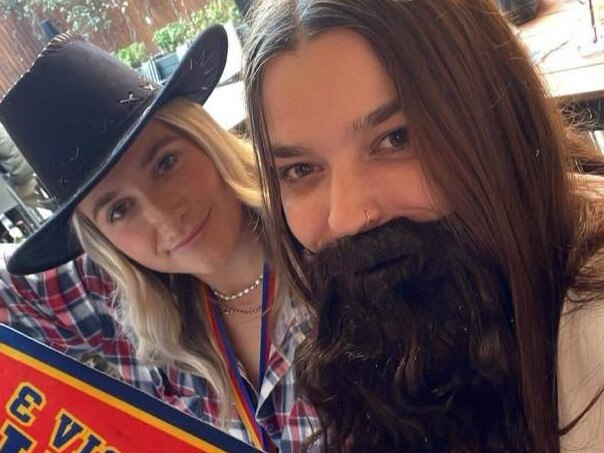 Carly Payne (left) and Jordan Sanderson (right, Jesus) celebrate Goodwood Saints‘ 2022 women’s flag. Picture: Supplied, Goodwood Saints Football Club