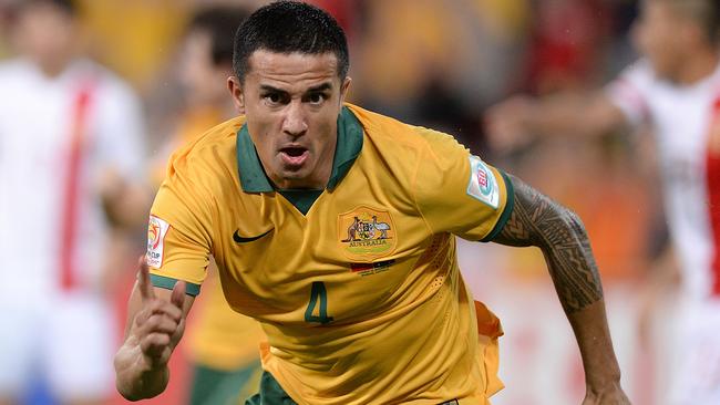 BRISBANE, AUSTRALIA - JANUARY 22: Tim Cahill of Australia cscores a goal during the 2015 Asian Cup match between China PR and the Australian Socceroos at Suncorp Stadium on January 22, 2015 in Brisbane, Australia. (Photo by Bradley Kanaris/Getty Images)