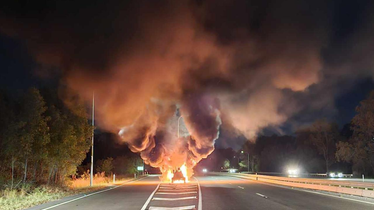 A vehicle has burst into flames on the Cunningham Highway at Blackstone. Picture: Cam Jay