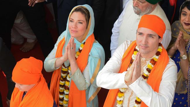 Canadian Prime Minister Justin Trudeau along with his wife Sophie Gregoire pay their respects at the Sikh Shrine Golden temple in Amritsar