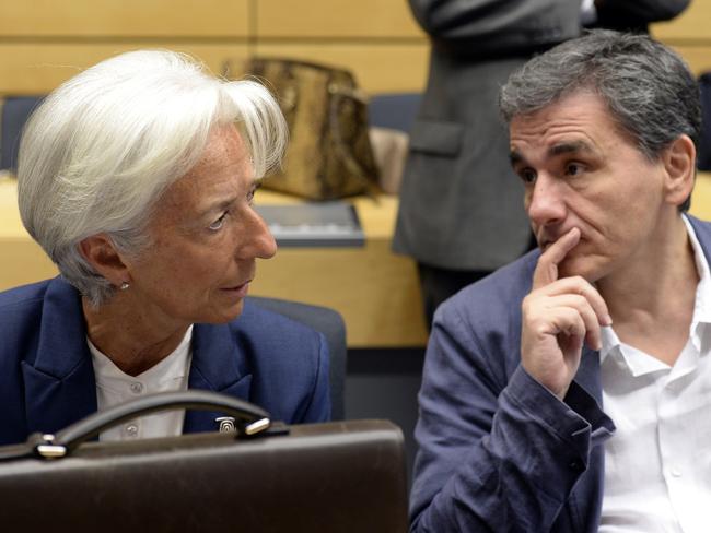 Crisis talks ... Greek Finance Minister Euclid Tsakalotos speaks with Managing Director of the International Monetary Fund Christine Lagarde during a meeting of the Eurogroup finance ministers in Brussels on July 12. Picture: AFP/Thierry Charlier