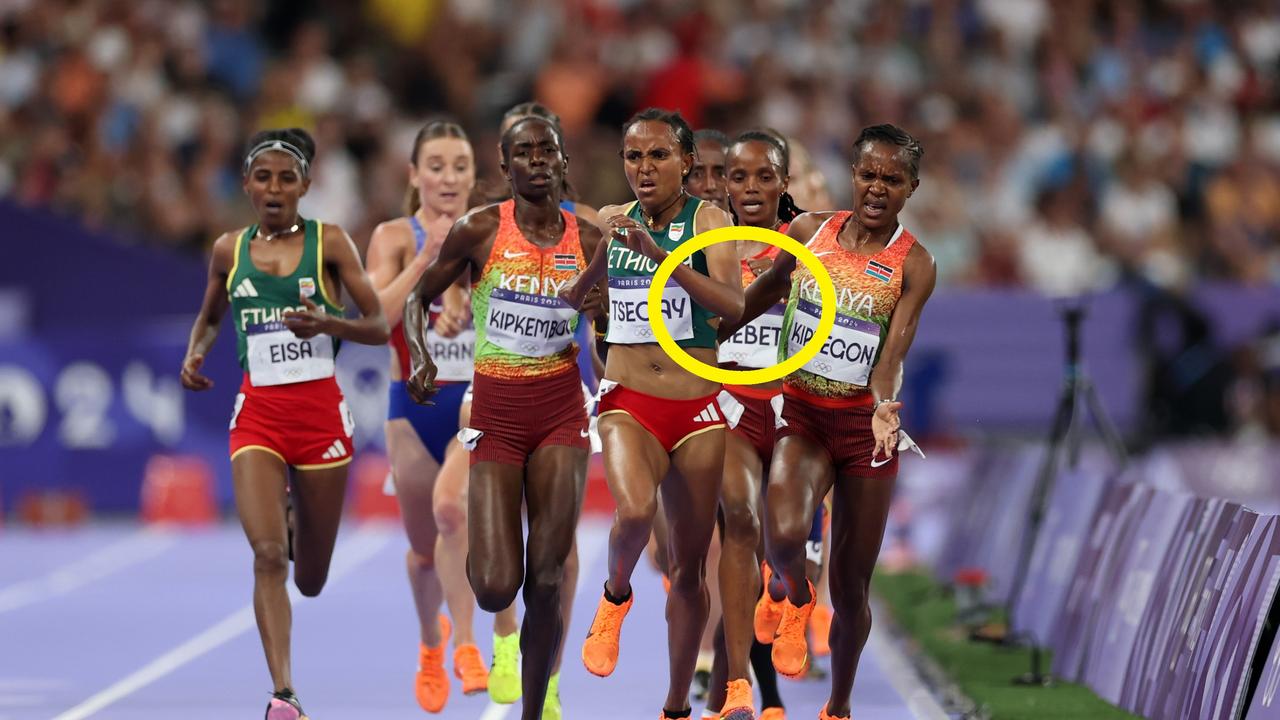 The contact between the runners that resulted in Kipyegon being disqualified. (Photo by Christian Petersen/Getty Images)