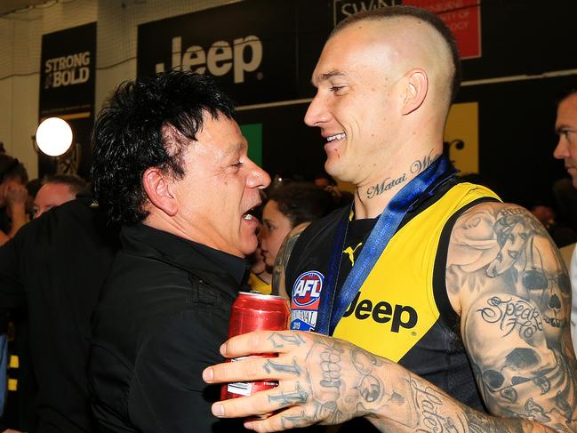 Dustin Martin hugs his manager Ralph Carr after the 2019 AFL Grand Final. Picture: Mark Stewart