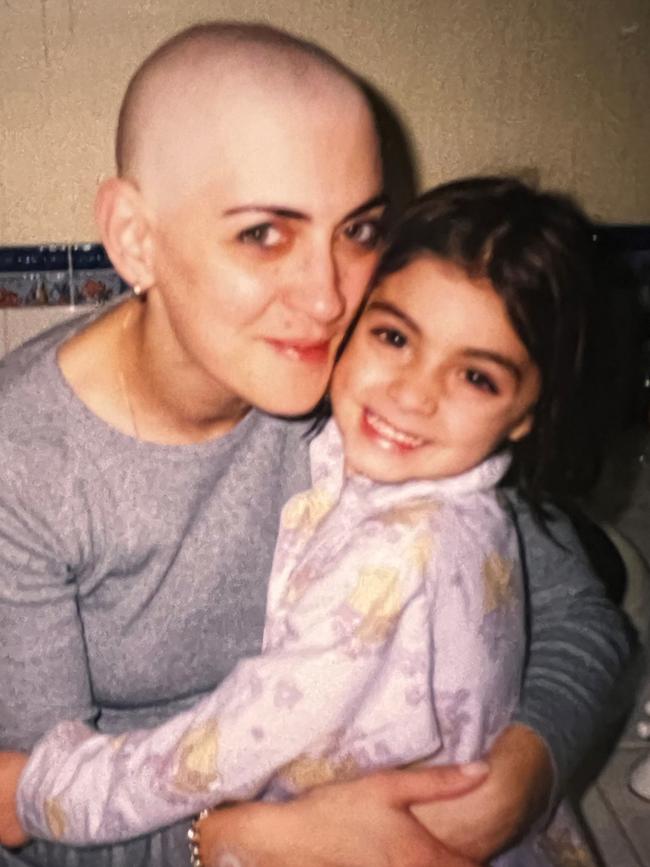 Four-year-old Nicolette Neofitou with her Mum, who shaved her head during her own cancer battle in 2002. Picture: Supplied