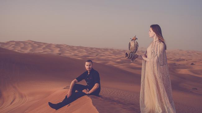 Adelaide designer Paul Vasileff and model in a Paolo Sebastian gown, photographed on location in Dubai during a South Australian trade mission in 2017. Photo credit: Broken Yellow