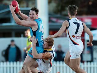 SANFL game at Unley Oval. Sturt v Adelaide Crows. Sturt's #43 Aidan Riley under pressure.  Picture: Dylan Coker