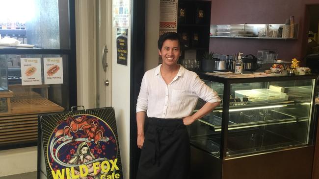 Inside the new Wild Fox Cafe, one of the new retailers that have joined the Wynnum CBD precinct owner Qu Starling in his shop.