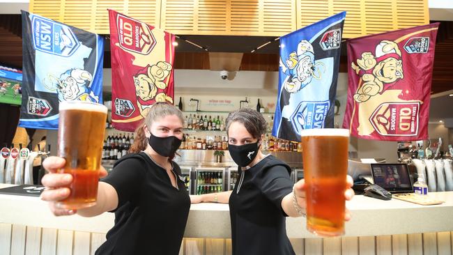 On the list for 'best places to watch Origin 'is Southport Sharks at Musgrave Hill. Staff members Tyler MacDonald and Bron Williams ready to serve patrons. Picture Glenn Hampson