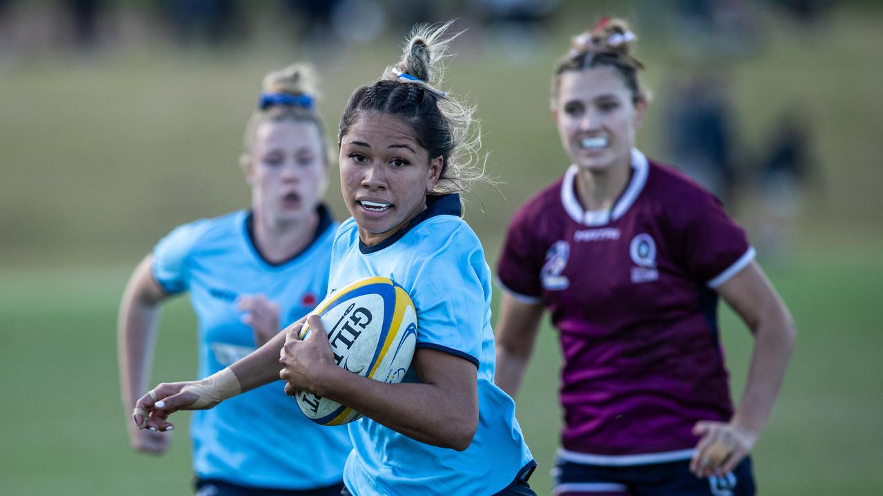 NSW gun Damita Betham on her way to scoring at the Australian schools rugby championship. Picture: Julian Andrews