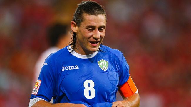 Server Djeparov of Uzbekistan looks on during the first round Asian Cup soccer match between China and Uzbekistan at the Suncorp Stadium in Brisbane on January 14, 2015. AFP PHOTO / PATRICK HAMILTON ---IMAGE RESTRICTED TO EDITORIAL USE - STRICTLY NO COMMERCIAL USE---