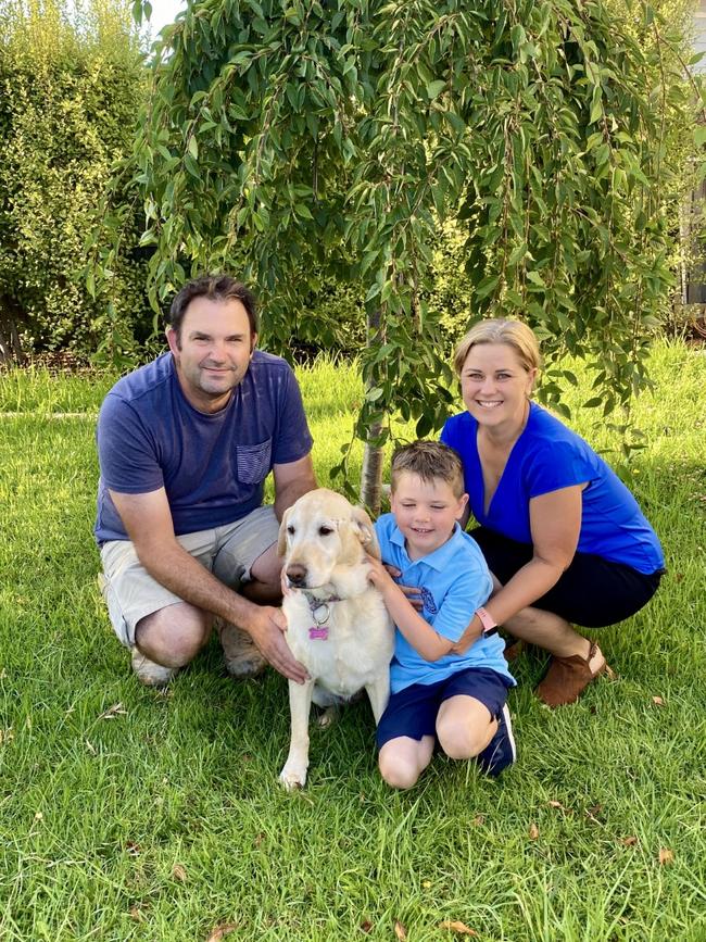 Jessica Hunter with her husband, son Lucas, 8, and family dog.