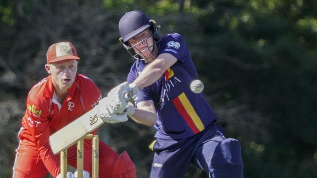 Baden Powell keeper Travis Kellerman watches on as Old Peninsula batsman Zac Bauer looks to go long. Picture: Valeriu Campan