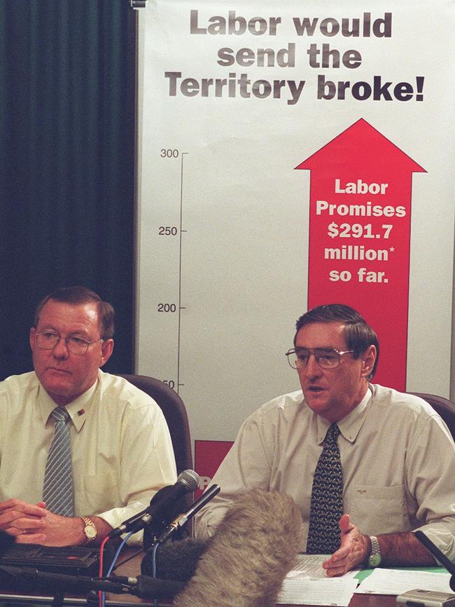 Denis Burke and Mike Reed at a press conference in 2001 claiming Labor would send the Territory broke.