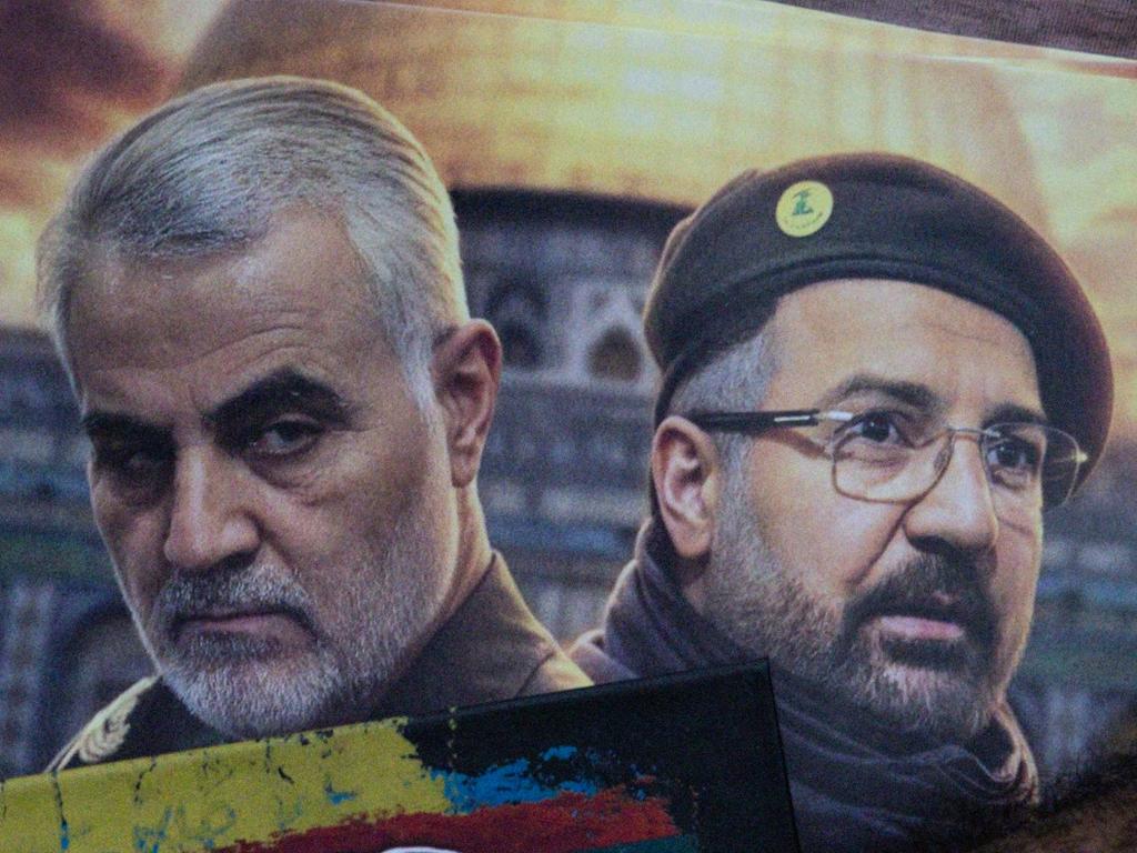 A poster of deceased Hezbollah top commander Fuad Shukr (R) and General Qasem Soleimani who served in the Iranian Revolutionary Guard. Picture: Chris McGrath/Getty Images