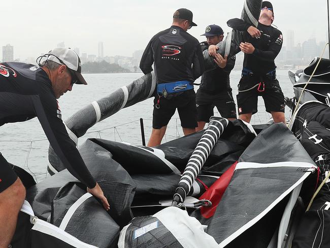 HOLD DO NOT USE WITHOUT PERMISSION FROM DAILY TELEGRAPH PICTURE EDITORS - Crew aboard Sunhungkai Scallywag during training on Sydney Harbour ahead of the 2018 Sydney Hobart Yacht Race. Picture: Brett Costello