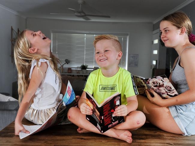 Lola Pugh-Jones with siblings Finn and Ruby doing home schooling. Picture: AAP