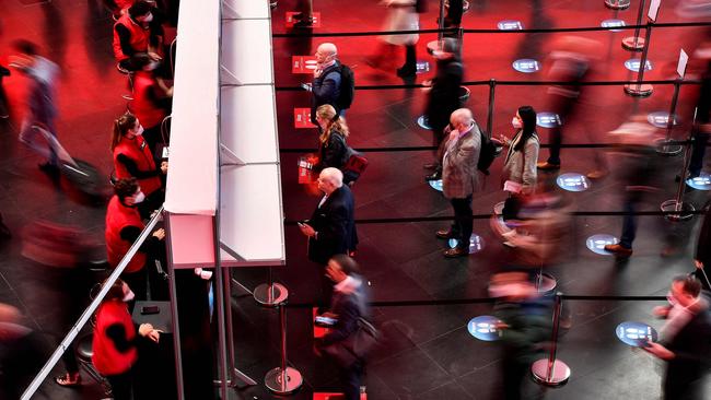 Visitors arrive on the opening day of the 2022 Mobile World Congress in Barcelona. Picture: AFP