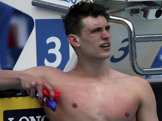 England's Ben Proud reacts after he was disqualified in his men's 50m butterfly heat during the 2018 Commonwealth Games at the Aquatic Centre on the Gold Coast, Australia, Thursday, April 5, 2018. (AP Photo/Rick Rycroft)