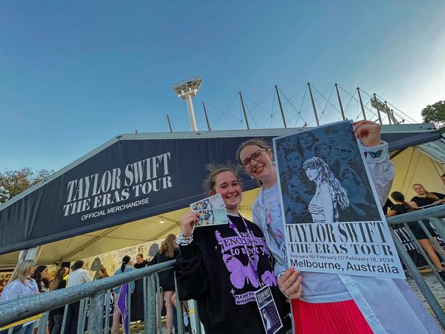 Taylor Swift fans Chelsea Patton and Bella Chalmers with their merchandise. Picture: Valeriu Campan