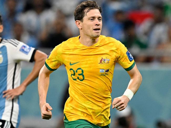 Australia's midfielder #23 Craig Goodwin celebrates scoring his team's first goal during the Qatar 2022 World Cup round of 16 football match between Argentina and Australia at the Ahmad Bin Ali Stadium in Al-Rayyan, west of Doha on December 3, 2022. (Photo by Alfredo ESTRELLA / AFP)