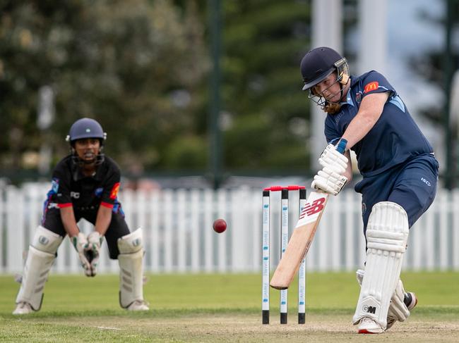 Power up: Manly’s Charlotte Allen drives towards cover as wicketkeeper Reet Kumar looks on. Picture: Julian Andrews