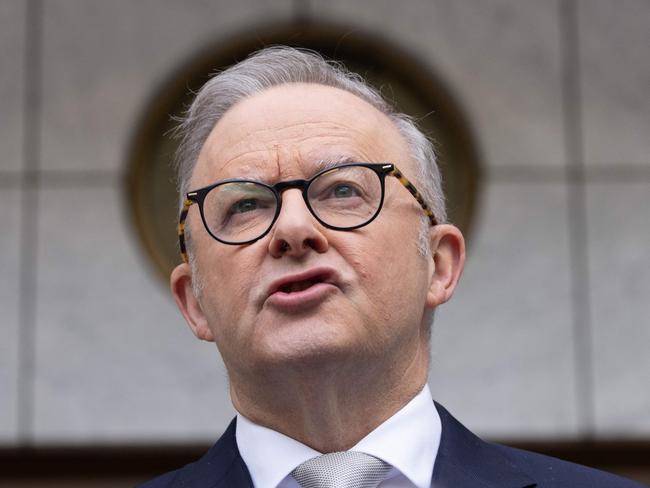 Despite a frenzy of spending, the Treasurer insisted that Labor had ended the election with a better budget position. (Photo by MIKE BOWERS / AFP)